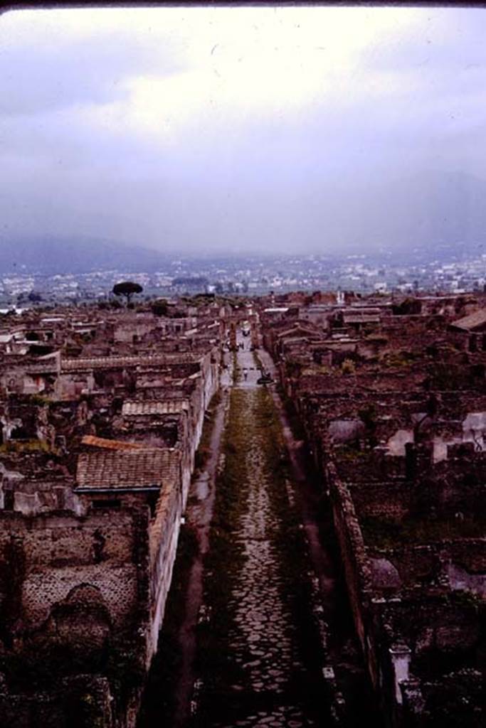 Via di Mercurio between VI.9 and VI.7. Looking south from Tower XI. Pompeii. 1964.  Photo by Stanley A. Jashemski.
Source: The Wilhelmina and Stanley A. Jashemski archive in the University of Maryland Library, Special Collections (See collection page) and made available under the Creative Commons Attribution-Non Commercial License v.4. See Licence and use details.
J64f1004