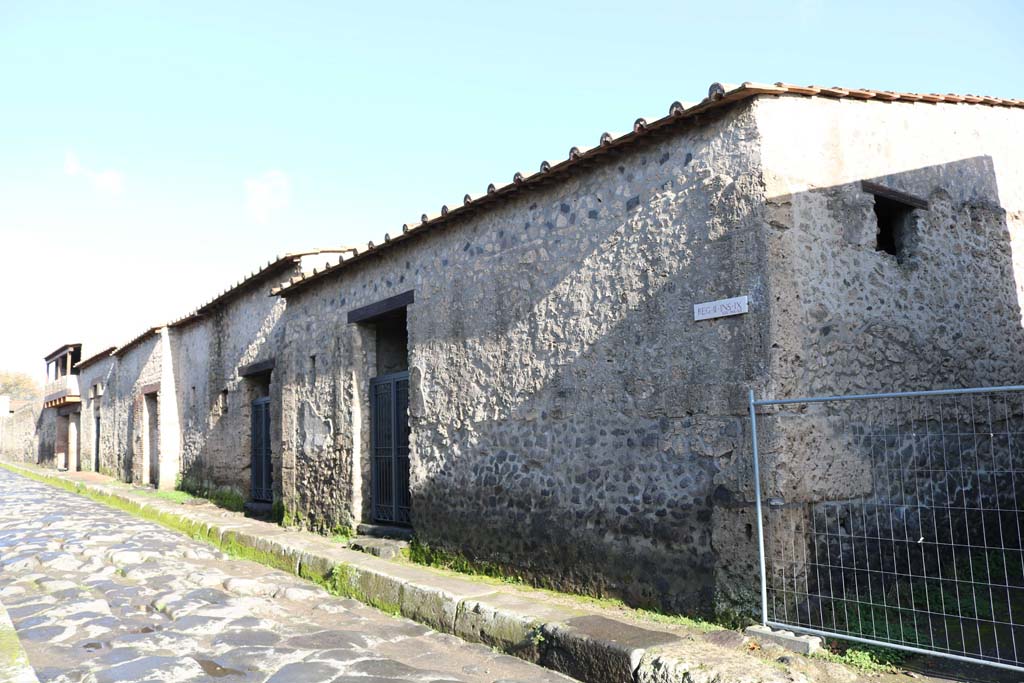 Via di Nocera, east side, Pompeii. December 2018. 
Looking north along insula II.9, from II.9.1, in centre, towards II.9.5, on left. Photo courtesy of Aude Durand.