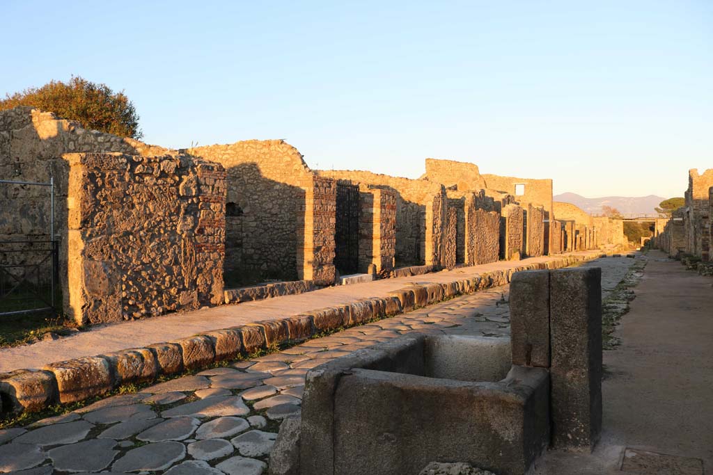 Via di Nola, north side. December 2018. 
Looking north-east along insula V.3 and V.4, from near fountain at IX.8.1, on south side. Photo courtesy of Aude Durand.