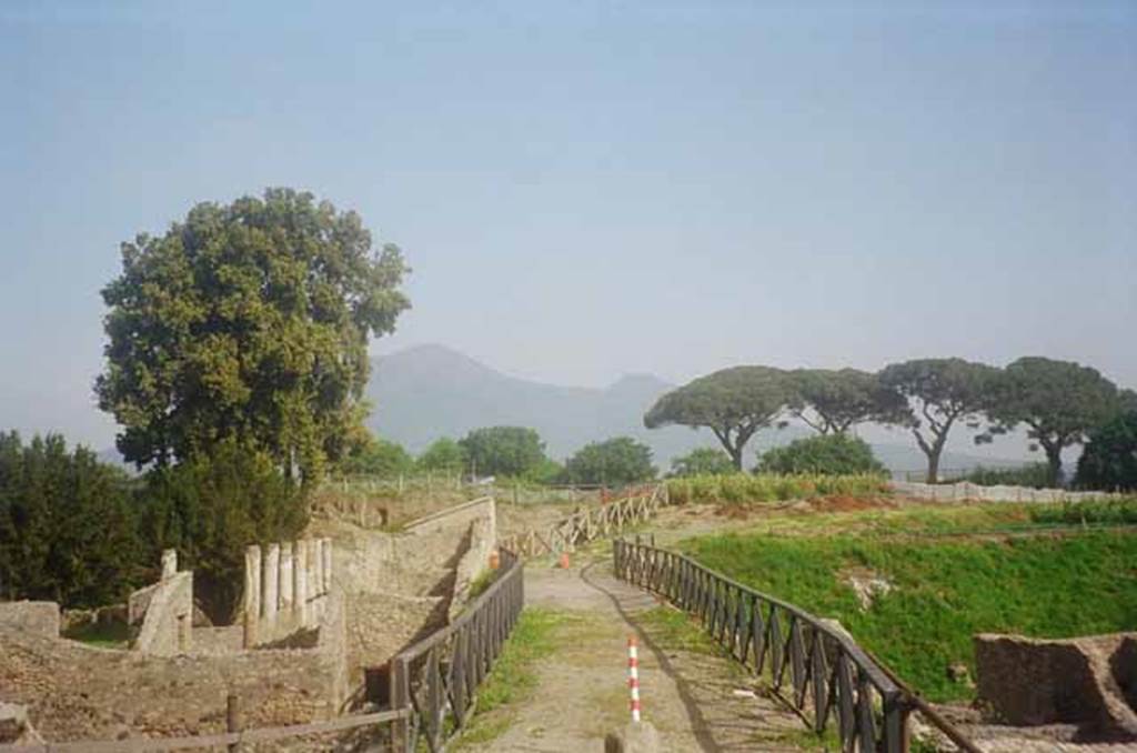 V.5.3 and V.5.4 Pompeii, on the east side of the insula. May 2010.  Looking north across the modern road bridge.  Photo courtesy of Rick Bauer.