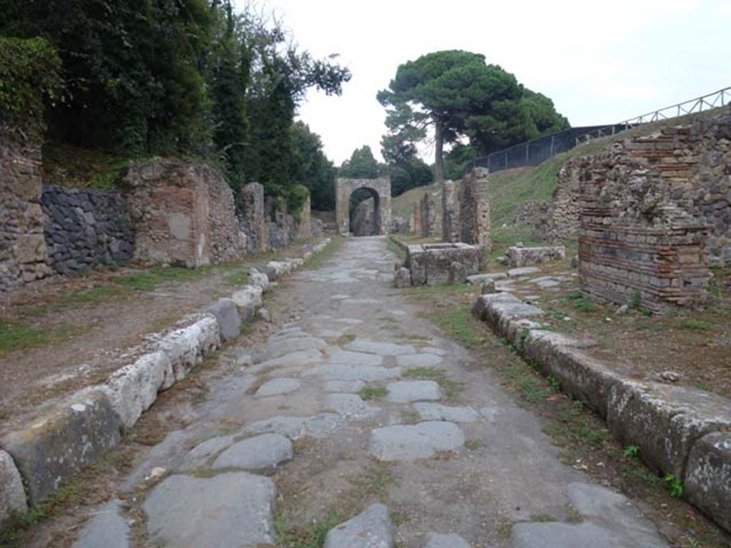 Via di Nola, September 2011. 
Looking east towards IV.5 and III.11, and towards crossroads with unexcavated unnamed vicolo. Photo courtesy of Michael Binns.