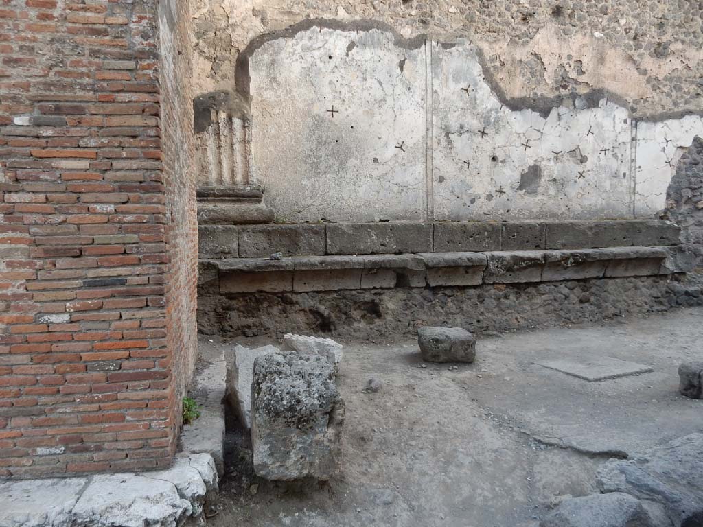 Vicolo dei Soprastanti, Pompeii. June 2019. Looking south from arch, (on left) towards north wall of Forum. 
Photo courtesy of Buzz Ferebee.
