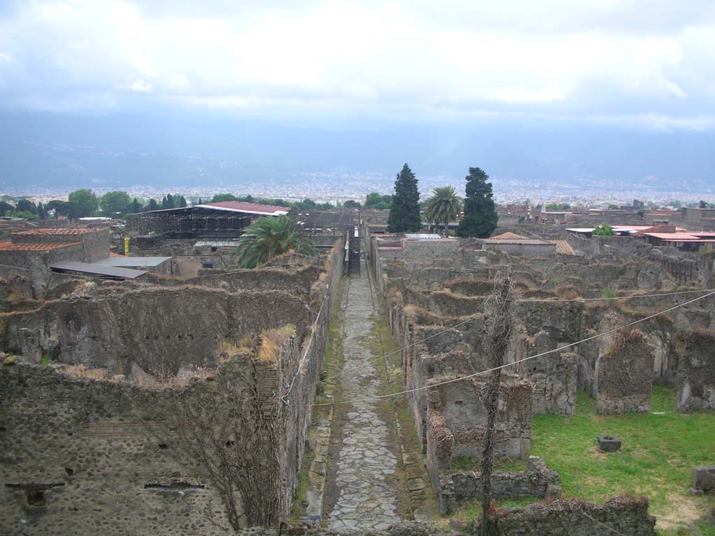 Vicolo del Labirinto, Pompeii. May 2010. 
Looking south from Tower X, with VI.15 on left, and VI.11 on right. Photo courtesy of Ivo van der Graaff.