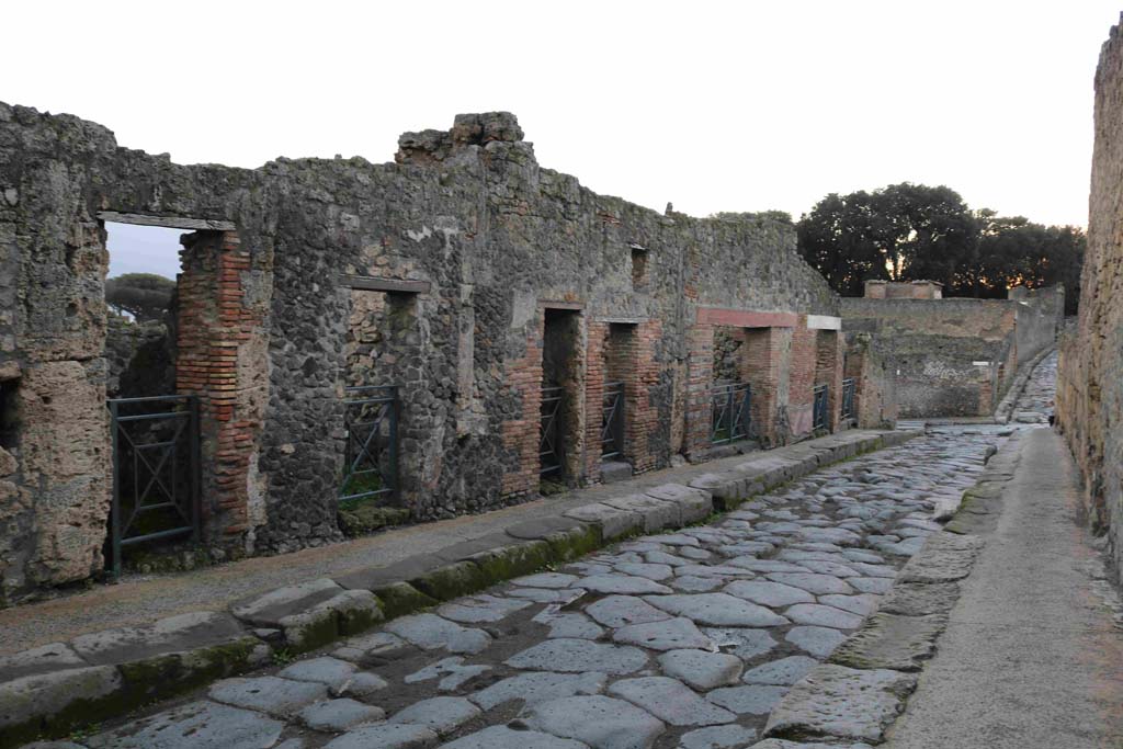 Vicolo del Menandro, Pompeii. December 2018. 
Looking west along I.3 (south side) towards junction with Via Stabiana. Photo courtesy of Aude Durand.