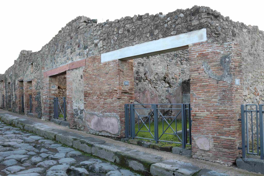Vicolo del Menandro, Pompeii. December 2018. 
Looking east along I.3 (south side) with doorways to I.3.17, 16, 15 and 14. Photo courtesy of Aude Durand.