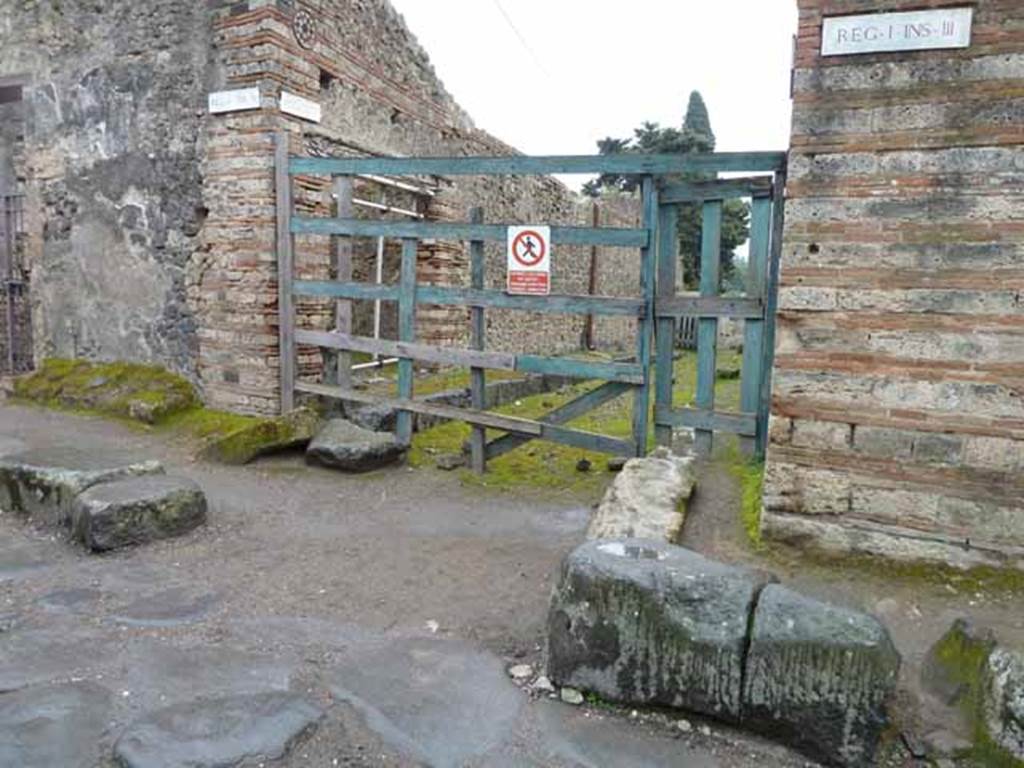 Vicolo del Menandro, May 2010. Looking south into Vicolo del Citarista, between I.10 and I.3.