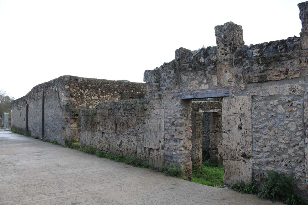 Vicolo della Nave Europa, west side, Pompeii. December 2018. 
 Looking south-west towards entrance doorway of I.16.7 in Vicolo della Nave Europa. Photo courtesy of Aude Durand.