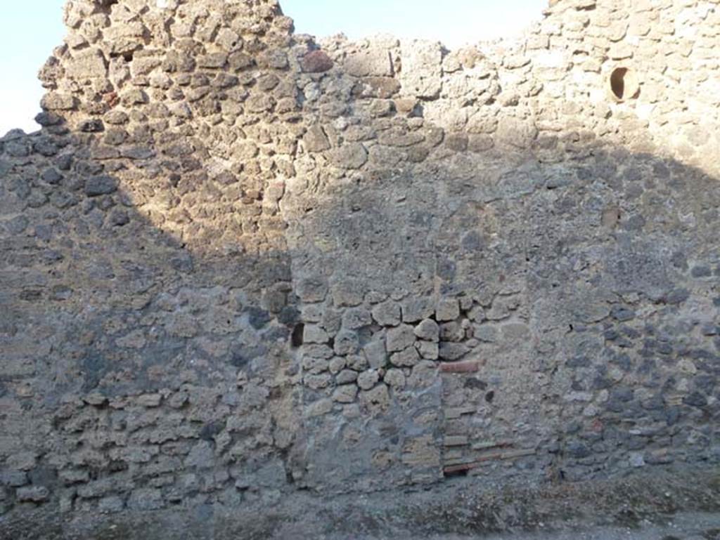 Vicolo di Lucrezio Frontone. June 2012. East side, showing side wall of V.4.1. Photo courtesy of Michael Binns.