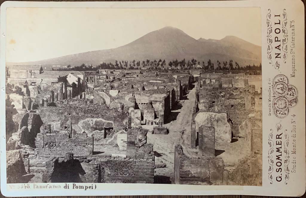 Vicolo di Modesto. c.1872. Looking north from above VII.6.7 (doorway, centre right) towards fountain at junction of Via Consolare with Vicolo di Modesto. 
Sommer cabinet card 5348 panorama di Pompei. Photo courtesy of Rick Bauer.