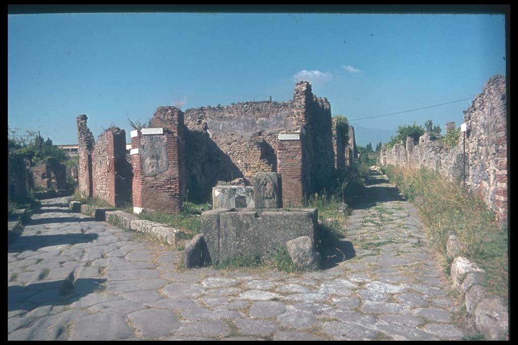Junction of Via Consolare (on left) and Vicolo di Modesto between VI.3 and VI.6. Looking north.
Photographed 1970-79 by Günther Einhorn, picture courtesy of his son Ralf Einhorn.