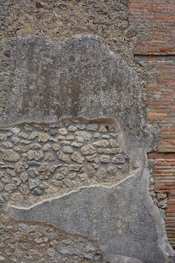 Vicolo di Tesmo, east side, Pompeii. May 2017. 
Detail of remaining stucco on exterior wall of IX.5.18/19/20/21.
Foto Christian Beck, ERC Grant 681269 DÉCOR.