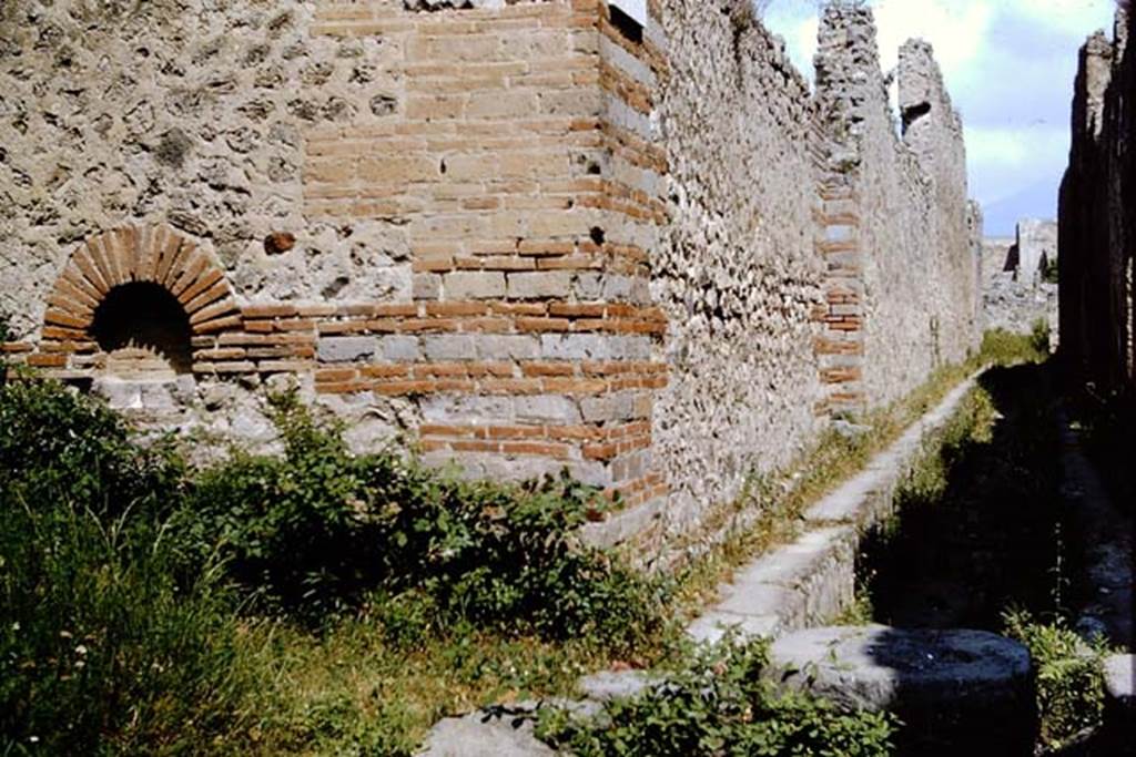 Vicolo di Tesmo between IX.4 and IX.5, on the right. Pompeii. 1964. Looking north from junction with unnamed vicolo, on the left. Photo by Stanley A. Jashemski.
Source: The Wilhelmina and Stanley A. Jashemski archive in the University of Maryland Library, Special Collections (See collection page) and made available under the Creative Commons Attribution-Non Commercial License v.4. See Licence and use details.
J64f1610