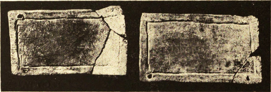 Pompeii Fondo Azzolini. Tomb 10. 
Two lead curse tablets, width 0.08m by 0.05m were found near to the ground, in front of the uninscribed columella of the Tomb.
See Notizie degli Scavi di Antichità, 1916, p. 304, fig. 15.
See Cooley, A. and M.G.L., 2004. Pompeii: A Sourcebook. London: Routledge. (p. 138).
