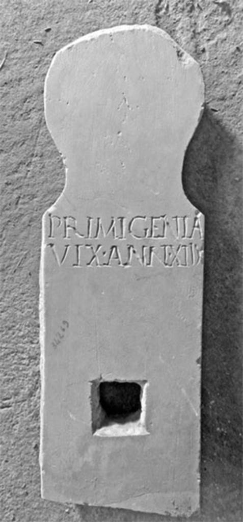 Pompeii Fondo Azzolini. Tomb 114: Primigenia.
Columella with inscription
PRIMIGENIA
VIX ANN XIIX
Primigenia
vix(it) ann(is) XIIX
See Notizie degli Scavi di Antichità, 1916, 303, t114.
Photo © Umberto Soldovieri.