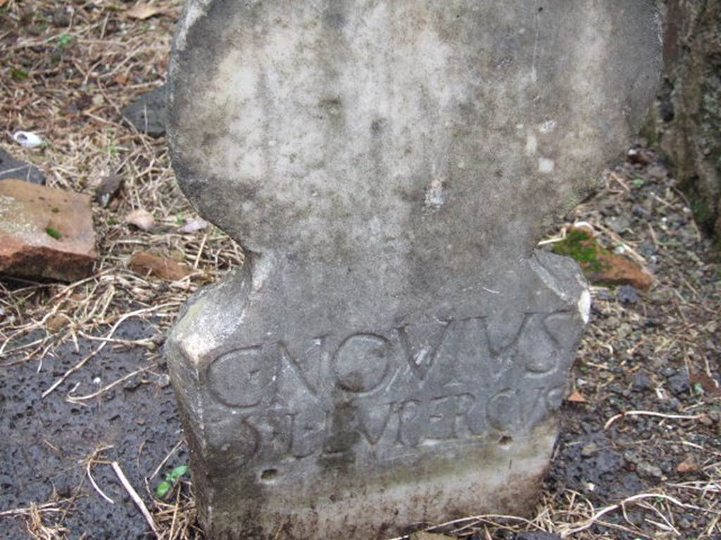 FPNE Pompeii. December 2005. Columella at south-west corner of arched monument, with inscription
C. NOVIVS
). L. LVPERCVS.
D’Ambrosio and De Caro expand this to:
C(aius) Novius
G(aiae) l(ibertus) Lupercus
See D’Ambrosio A. and De Caro S., 1988. Römische Gräberstraßen. München: C.H.Beck. p. 208.