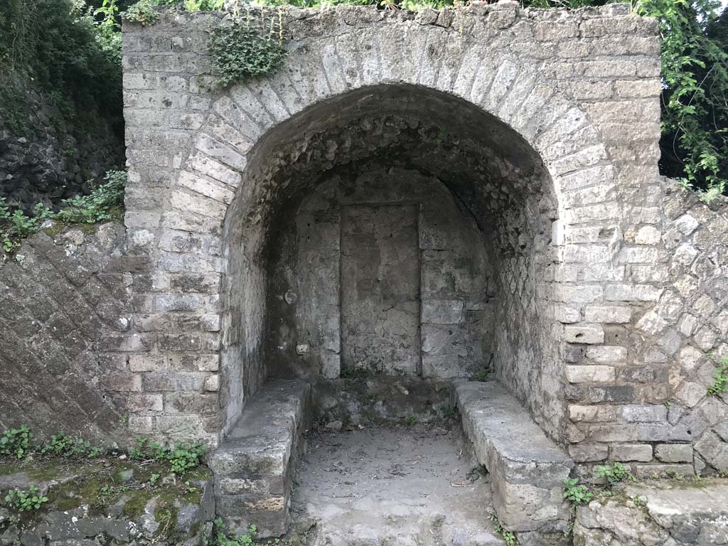 HGW01 Pompeii. April 2019. Looking west towards benches around the arched tomb of Marcus Cerrinius Restitutus. 
Photo courtesy of Buzz Ferebee.