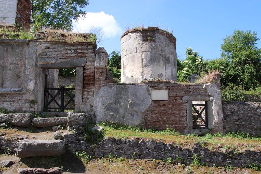 HGW18 Pompeii, on right. May 2024. 
Looking west towards doorway to tomb, with doorway to HGW17, on left. Photo courtesy of Klaus Heese.