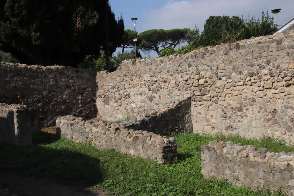 HGW25 Pompeii. Part of Villa of Diomedes. October 2023. 
Room 7,6 looking towards north-west corner, with rooms 7,10 with 7,11 on left and doorway to room 7.12, on right. Photo courtesy of Klaus Heese.