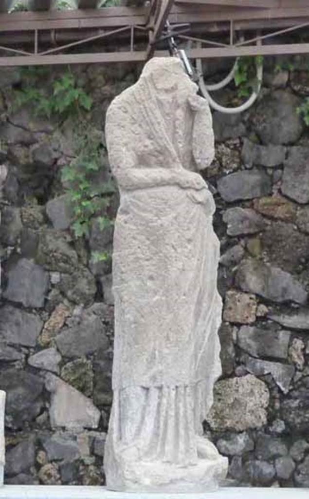 Pompeii Porta Nocera. Tomb 10EN. May 2010. Statue in storage area on Via delle Tombe. According to the Giornale di Scavi of July 1954 a female statue was found between 10EN and 12EN. The statue was in the style of Pudicitia, and was in tufa. SAP inventory number 14497.
See D’Ambrosio, A. and De Caro, S., 1983. Un Impegno per Pompei: Fotopiano e documentazione della Necropoli di Porta Nocera. Milano: Touring Club Italiano. (10EN).