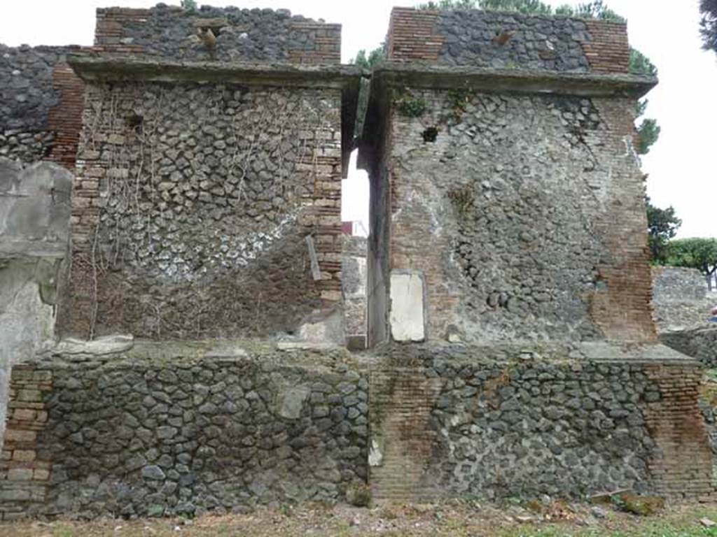 Pompeii Porta Nocera. May 2010. Tombs 12EN and 10EN, rear north sides. Looking south.