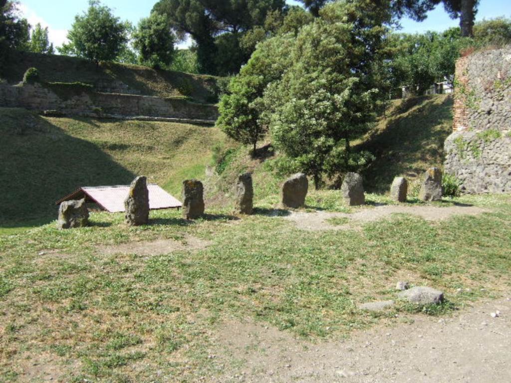 Pompeii Porta Nocera. Tomb 34EN, tomb of Afrea Prima?  May 2006.
The tomb has eight cippi. The seventh one from the west has a triangular top and an inscription
AFREIA
M(arci)  L(iberta) 
PRIMA.
This does not necessarily name the tomb.
See D’Ambrosio, A. and De Caro, S., 1983. Un Impegno per Pompei: Fotopiano e documentazione della Necropoli di Porta Nocera. Milano: Touring Club Italiano. (34EN).