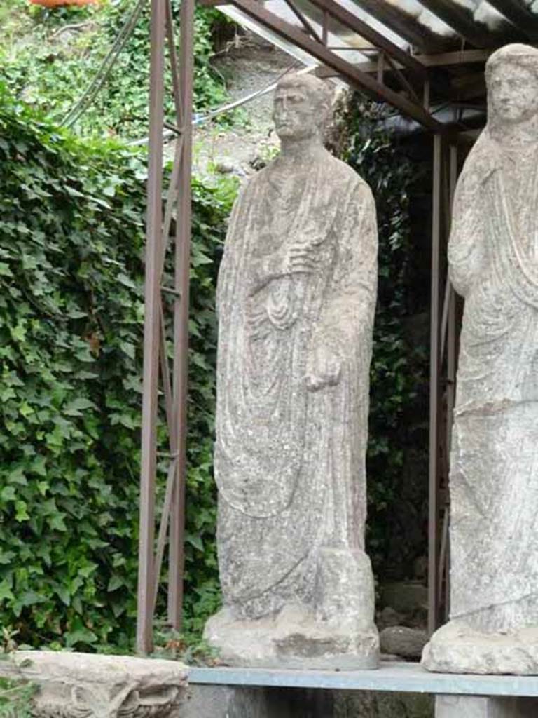 Pompeii Porta Nocera. Tomb 34aEN. May 2010.
One of the three statues found, a male wearing a toga.