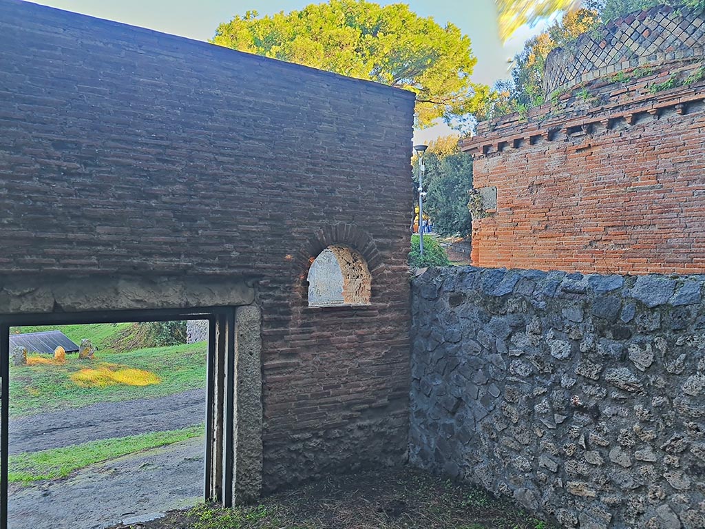 Pompeii Porta Nocera. October 2024. 
Tomb 15ES. Looking north-east from interior towards entrance doorway and arched opening. Photo courtesy of Giuseppe Ciaramella.
.