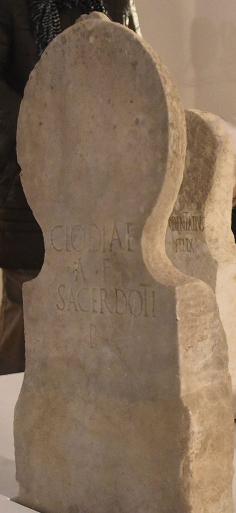 Pompeii Porta Nocera. Tomb 5OS. 2017. Cippus of Clodia Auli Filiae Sacerdoti Publicae.
Marble cippus with inscription of 
CLODIAE
A(uli) F(iliae)
SACERDOTI
P(ublicae).