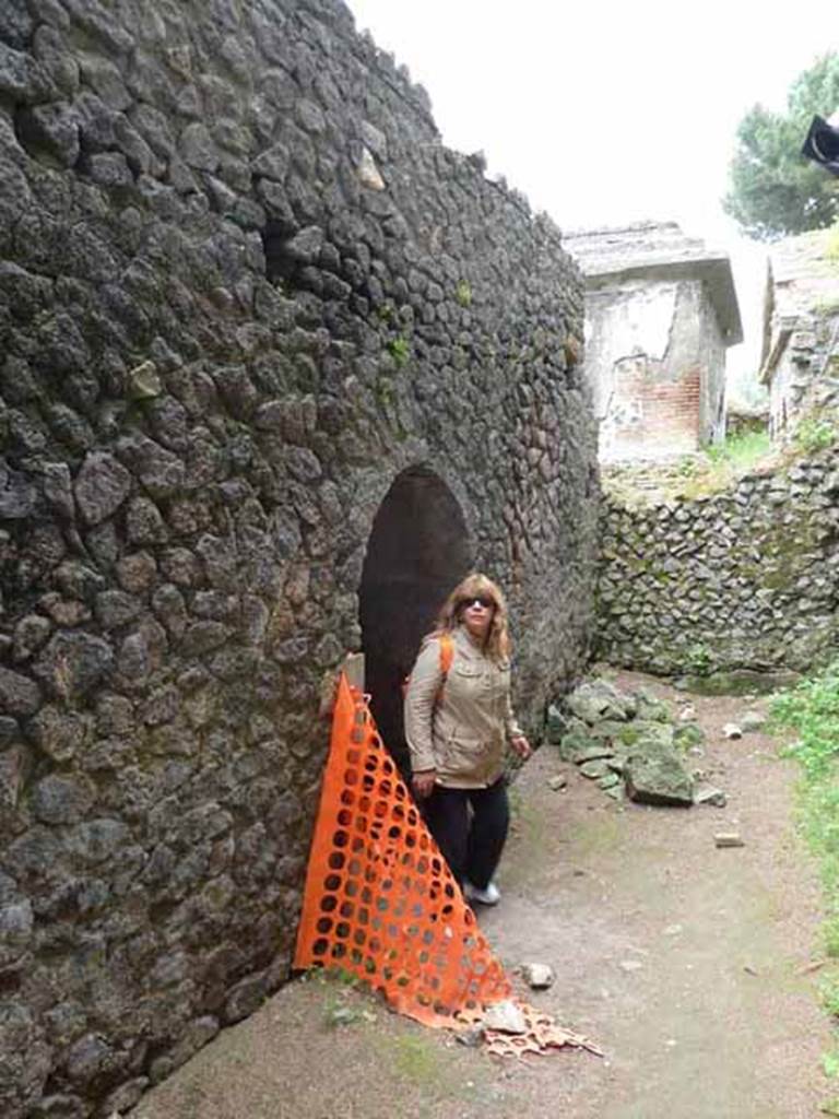 Pompeii Porta Nocera. Tomb 7OS. May 2010. Looking east along rear south wall with corridor in centre, towards Tomb 5OS.