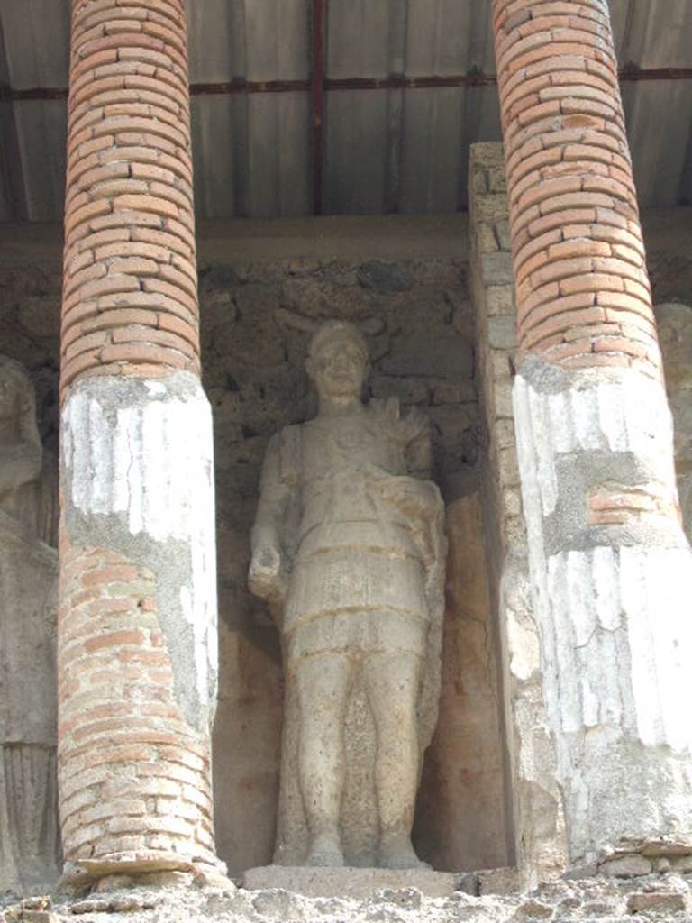 Pompeii Porta Nocera Tomb 13OS. May 2006. Male statue of a soldier in military dress.
