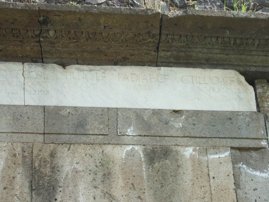 Pompeii Porta Nocera Tomb 17OS. May 2006. Marble plaque with inscriptions, right hand side.