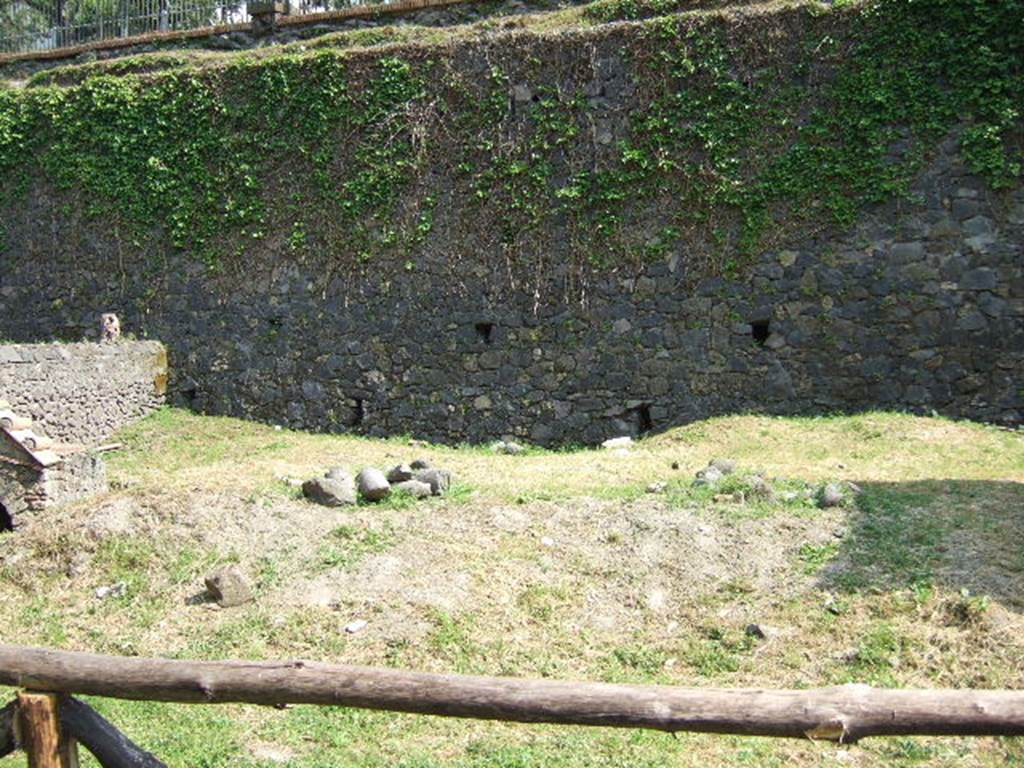 Pompeii Porta Nocera. May 2006. Looking south.
Side wall of Tombs 23OS and 25aOS, on the left, and to Tomb 27OS, on the right.