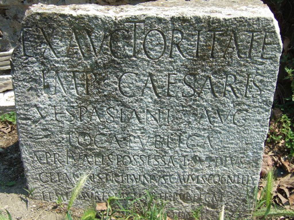 VGSC Pompeii Porta Vesuvio. May 2006. Cippus of Titus Suedius Clemens. 
The Cippus has a latin inscription reading -
Ex auctoritate 
imp(eratoris) Caesaris 
Vespasiani Aug(usti)
loca publica,
a privatis possessa T(itus) Suedius 
Clemens tribunus causis cognitis 
Et mensuris factis rei publicae
Pompeianorum restituit  
This translates as -
By virtue of authority conferred upon him by the Emperor Vespasian Caesar Augustus, 
Titus Suedius Clemens, tribune, having investigated the facts and taken measurements,
restored to the citizens of Pompeii public places illegally appropriated by private persons.
Similar Cippi were found at the Porta Ercolano, Porta Marina and the Porta Nocera.  The wording “rei publicae Pompeianorum” on one of these, discovered in 1763, was the first positive identification that the site was Pompeii.  Until then scholars had divided opinions on the city buried under Civita.  Many, including the first official excavators, thought it was the ancient city of Stabiae. See Conticello, B., Ed, 1990. Rediscovering Pompeii. Rome: L’Erma di Bretschneider. (p. 225).