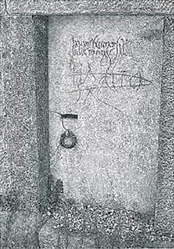 Tomb SG5 Pompeii. 2002. Door with graffiti.
Photo courtesy o! the Pompeii Archaeological Research Project: Porta Stabia.
The door in the south wall is a single block of limestone 1.68m high by 0.85m wide, with a well-preserved bronze lock.
See Campbell V.L., 2014. The Tombs of Pompeii: Organization, Space, and Society. Routledge: Abingdon UK, p. 304-5.