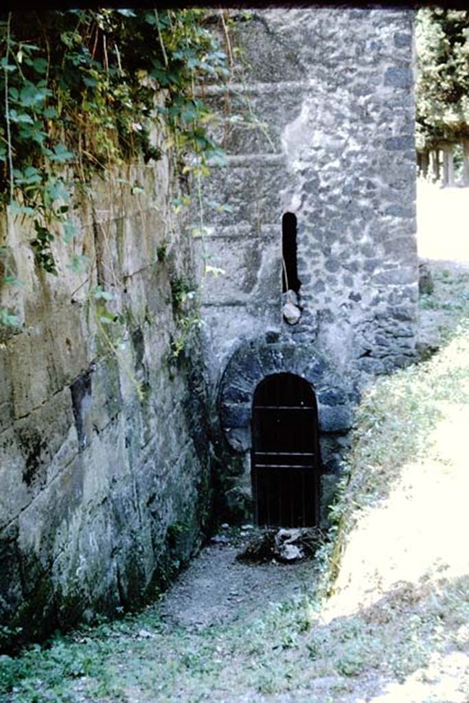 Tower X. Pompeii. 1964.  East side with arched doorway.   Photo by Stanley A. Jashemski.
Source: The Wilhelmina and Stanley A. Jashemski archive in the University of Maryland Library, Special Collections (See collection page) and made available under the Creative Commons Attribution-Non Commercial License v.4. See Licence and use details.
J64f1631