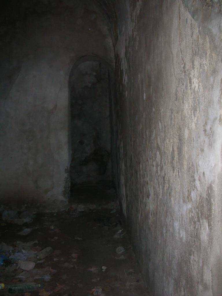 Tower X, Pompeii. May 2010. 
South-west corner of room on lower floor, with arched doorway. Photo courtesy of Ivo van der Graaff.