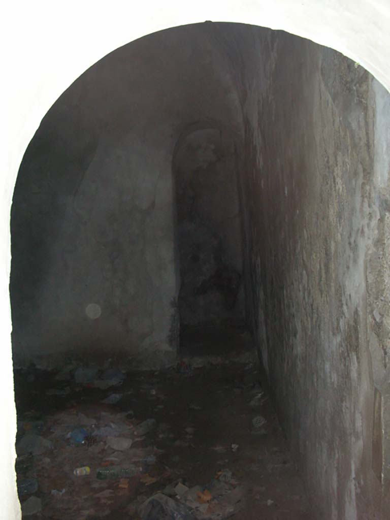 Tower X, Pompeii. May 2010. 
Small arched doorway in south-west corner of lower room. Photo courtesy of Ivo van der Graaff.