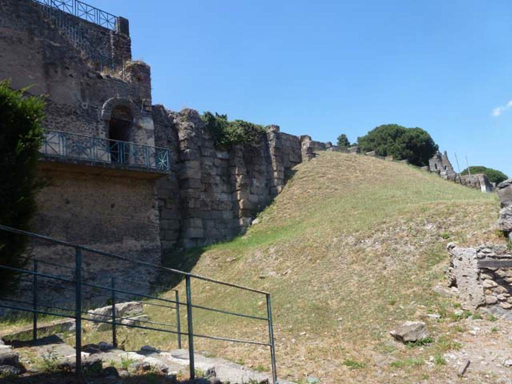 T11 Pompeii. June 2012. Tower XI, on left, looking north-east along walls from end of Via Mercurio. On the extreme right is the north-west corner of insula 9. Photo courtesy of Michael Binns.