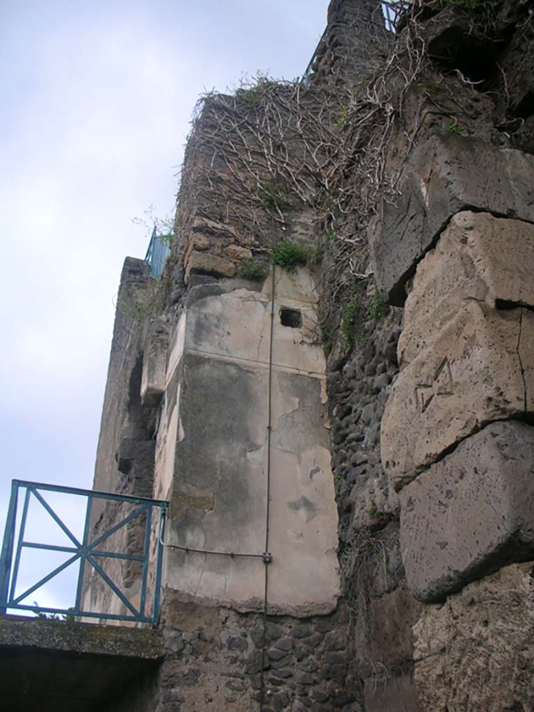 Tower XI, Pompeii. May 2010. 
Looking west towards remaining decoration on east side of doorway. Photo courtesy of Ivo van der Graaff.