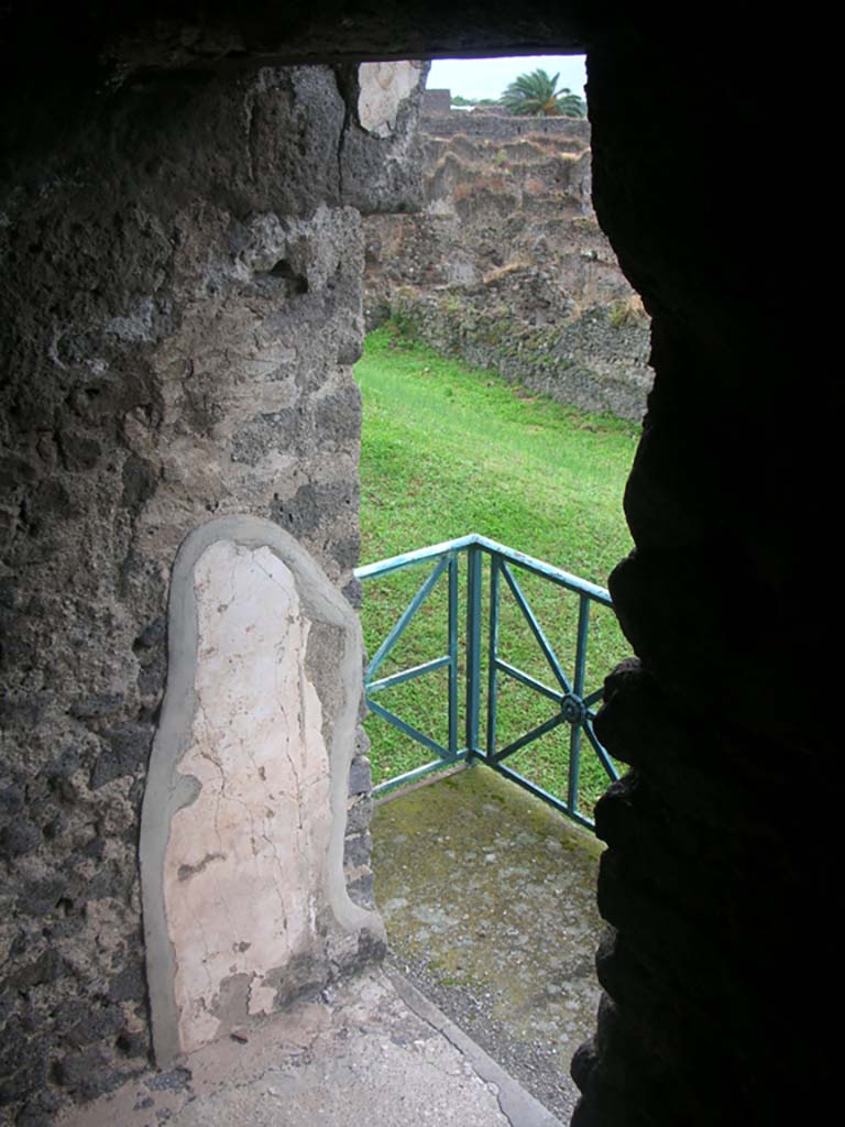 Tower XI, Pompeii. May 2010. 
Looking towards east wall at side of entrance doorway on south side of tower.
Photo courtesy of Ivo van der Graaff.