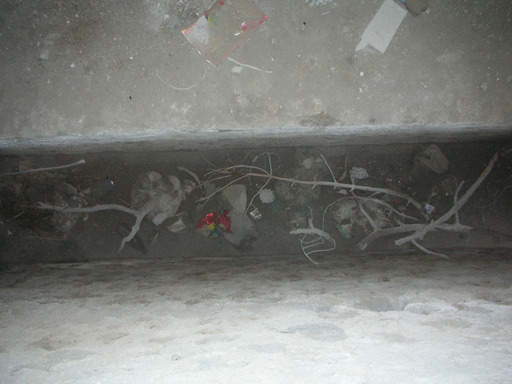 Tower II, Pompeii. May 2010. 
Looking down through rectangular opening in north wall. Photo courtesy of Ivo van der Graaff.