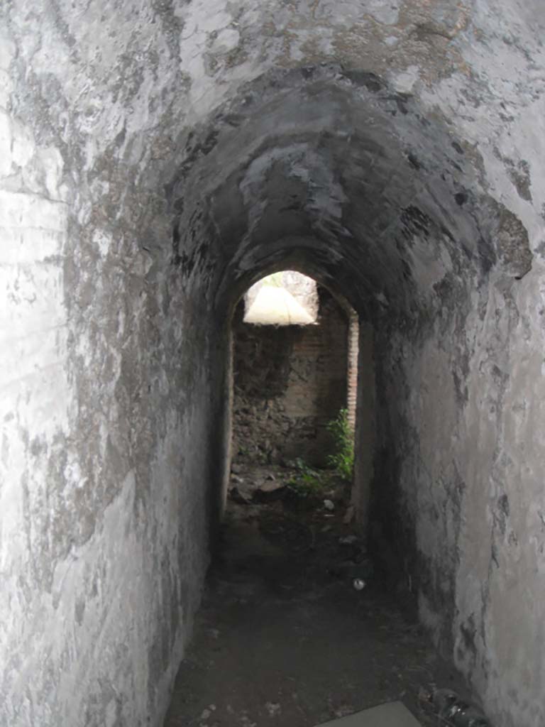 Tower V, Pompeii. May 2011. 
Corridor with lowered ceiling, looking towards arrow slit rendered ineffective. Photo courtesy of Ivo van der Graaff.
