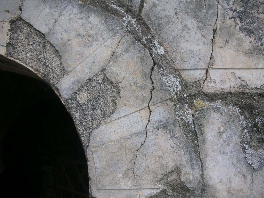 Tower VI, Pompeii. May 2010. 
Detail of remaining stucco on upper east doorway. Photo courtesy of Ivo van der Graaff.