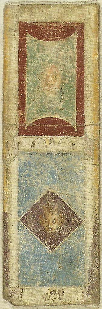 Gragnano. Rustic villa by the Strada Statale 145 Sorrentina. 
South wall of cubiculum 5.
Fresco panel with little masks separated by a white border with lotus flowers. 
The upper mask is a Silenus mask.
The lower is a Medusa mask.
Stabia Antiquarium inventory number 66660. See Otium Ludens, curated by Guzzo, P, Bonifacio, G, and Sodo, A.M. (2007). Castellammare di Stabia: Nicola Longobardi, p. 175.
