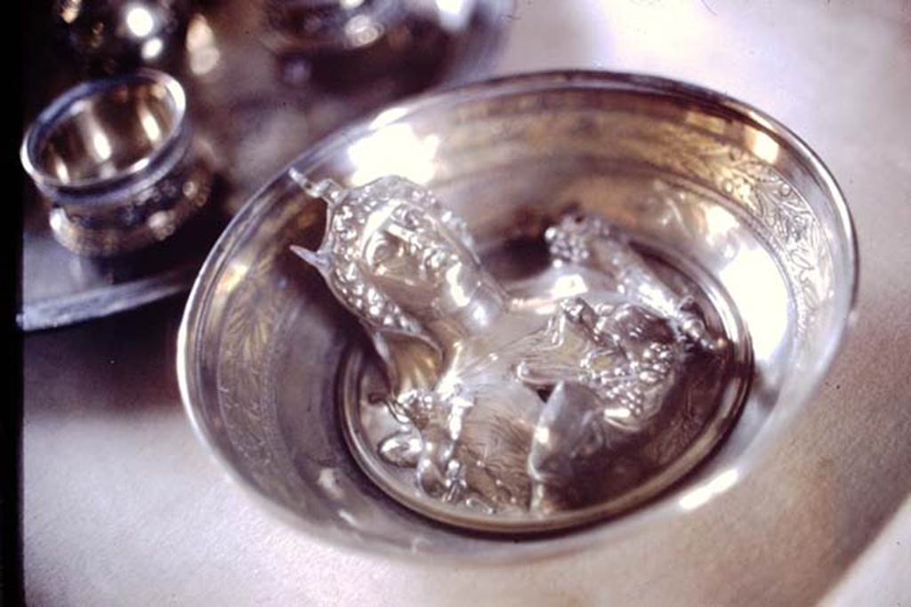 Villa della Pisanella, Boscoreale. 1974. Silver and gold plate with female figure with elephants trunk on head and holding a cornucopia.
Now in the Louvre. Inventory number BJ1969 or BJ1865. Part of silver treasure. Photo by Stanley A. Jashemski.   
Source: The Wilhelmina and Stanley A. Jashemski archive in the University of Maryland Library, Special Collections (See collection page) and made available under the Creative Commons Attribution-Non-Commercial License v.4. See Licence and use details.
J74f0828