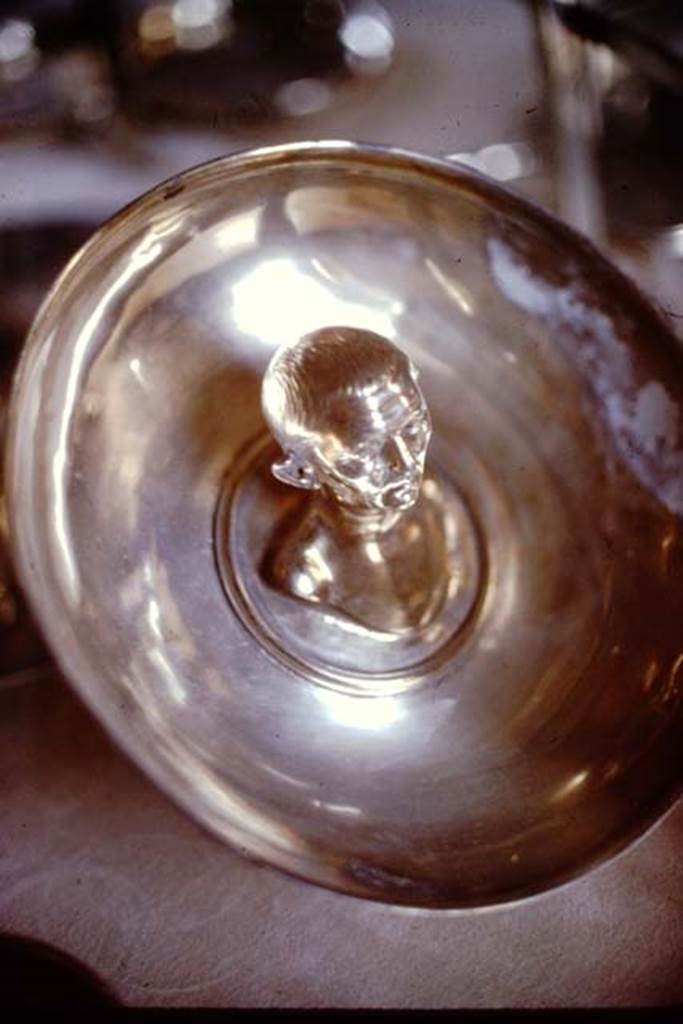 Villa della Pisanella, Boscoreale. 1974. 
Silver plate with head of man prominent, part of silver treasure.. Now in the Louvre. 
Photo by Stanley A. Jashemski.   
Source: The Wilhelmina and Stanley A. Jashemski archive in the University of Maryland Library, Special Collections (See collection page) and made available under the Creative Commons Attribution-Non Commercial License v.4. See Licence and use details.
J74f0830