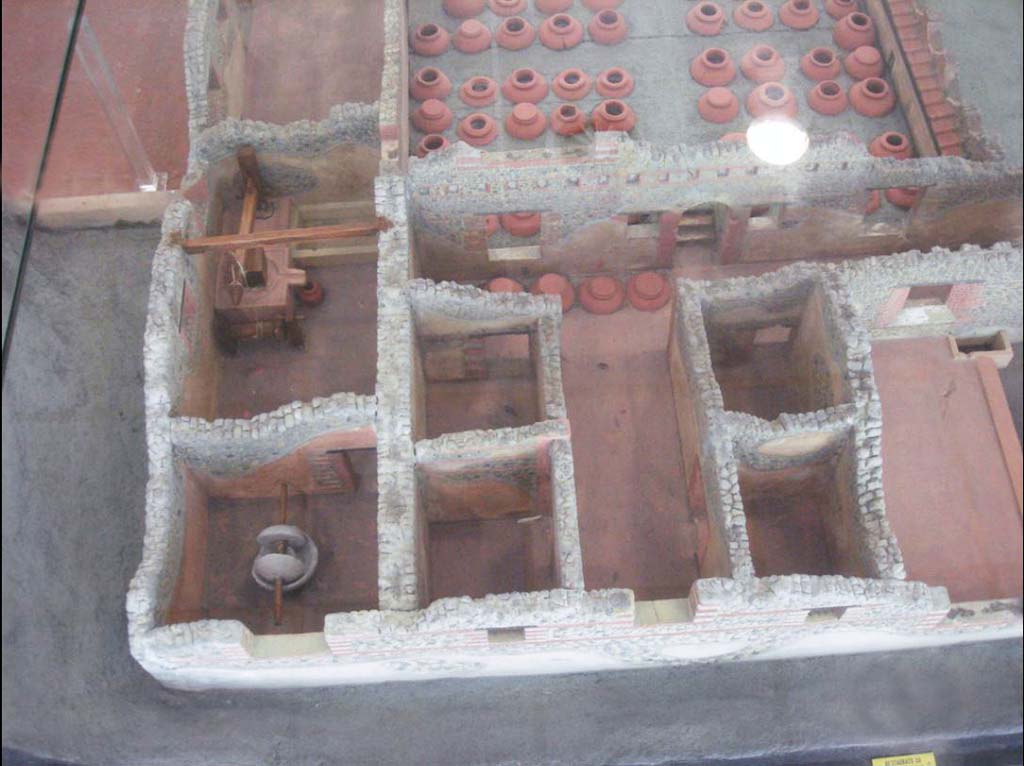 Villa della Pisanella, Boscoreale. The four rooms on the right are in area “R” arranged symmetrically on either side of a kind of entrance hall. 
Model of villa in Boscoreale Antiquarium.