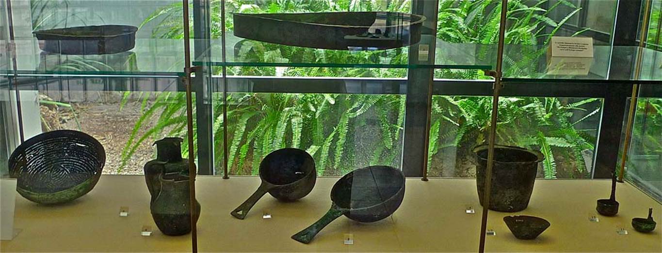 Villa della Pisanella, Boscoreale. July 2010. Detail of 12 bronze items (one is temporarily removed) found in the villa. 
Now in Boscoreale Antiquarium. Photo courtesy of Michael Binns.
