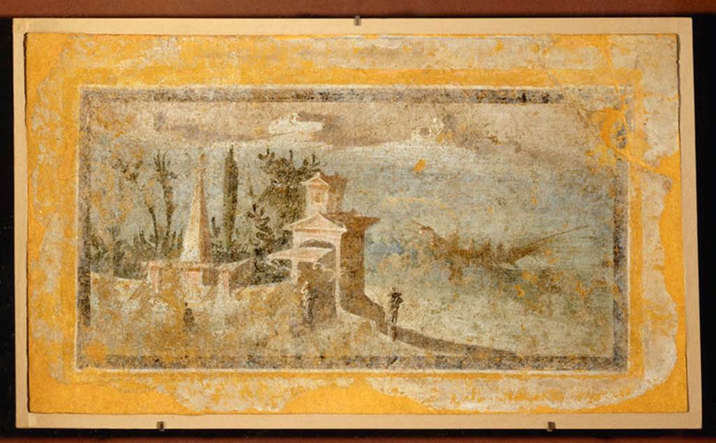 Villa rustica del fondo Ippolito Zurlo, Pompeii. 2005. Room B triclinium. South wall. 
Painting of a landscape of the seashore, with a boat, a pyramid and a building with garden at its back. 
Now in the Louvre. Inventory number P24. 
Photo © RMN-Grand Palais (musée du Louvre) / Erich Lessing.
Paysage Maritime Louvre P24 on rmn.fr