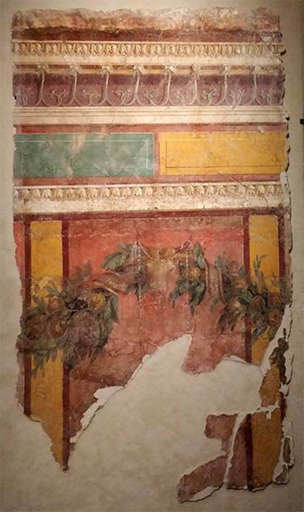Villa of P. Fannius Synistor at Boscoreale. Room L, tablinum, east wall. 
Panel with garland, bucranium, red panels with yellow dividing bars, yellow and green blocks with cornice above. 
Now in the Musée de Picardie, Amiens, France.
See http://amiens.fr/votre_vie_quotidienne/vie_culturelle/musees_damiens/musee_de_picardie.html